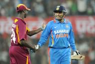Kemar Roach congratulating Virender Sehwag for his epical 219 runs knock